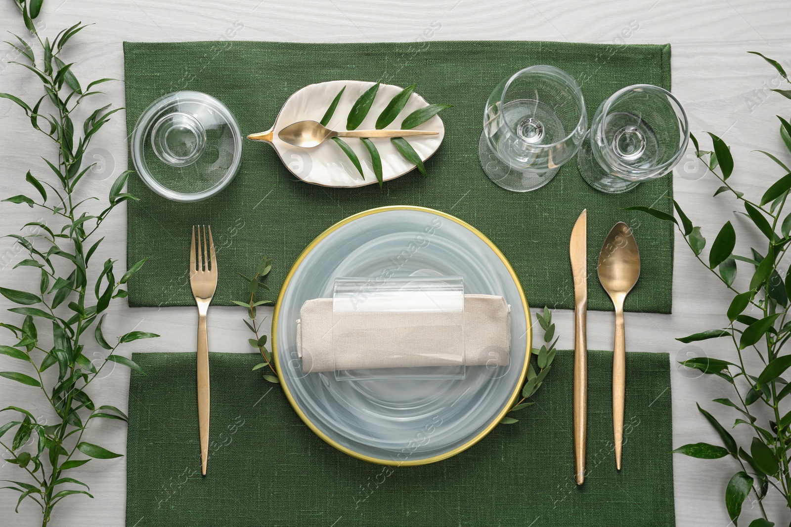 Photo of Elegant festive setting on white wooden table, flat lay