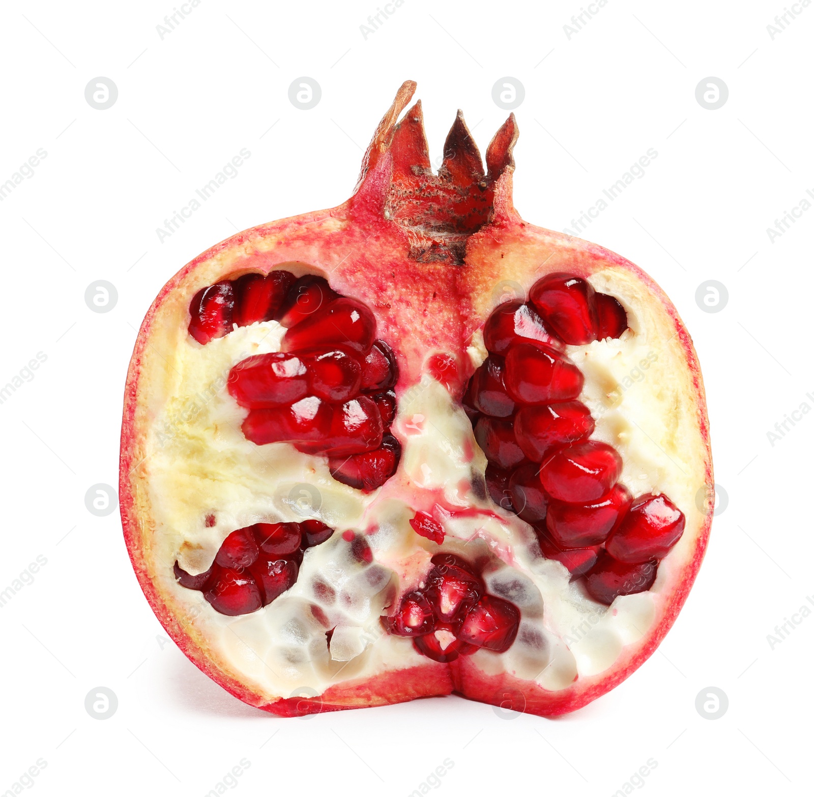 Photo of Ripe fresh pomegranate half with juicy seeds on white background