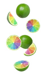 Fresh limes with rainbow segments falling on white background. Brighten your life