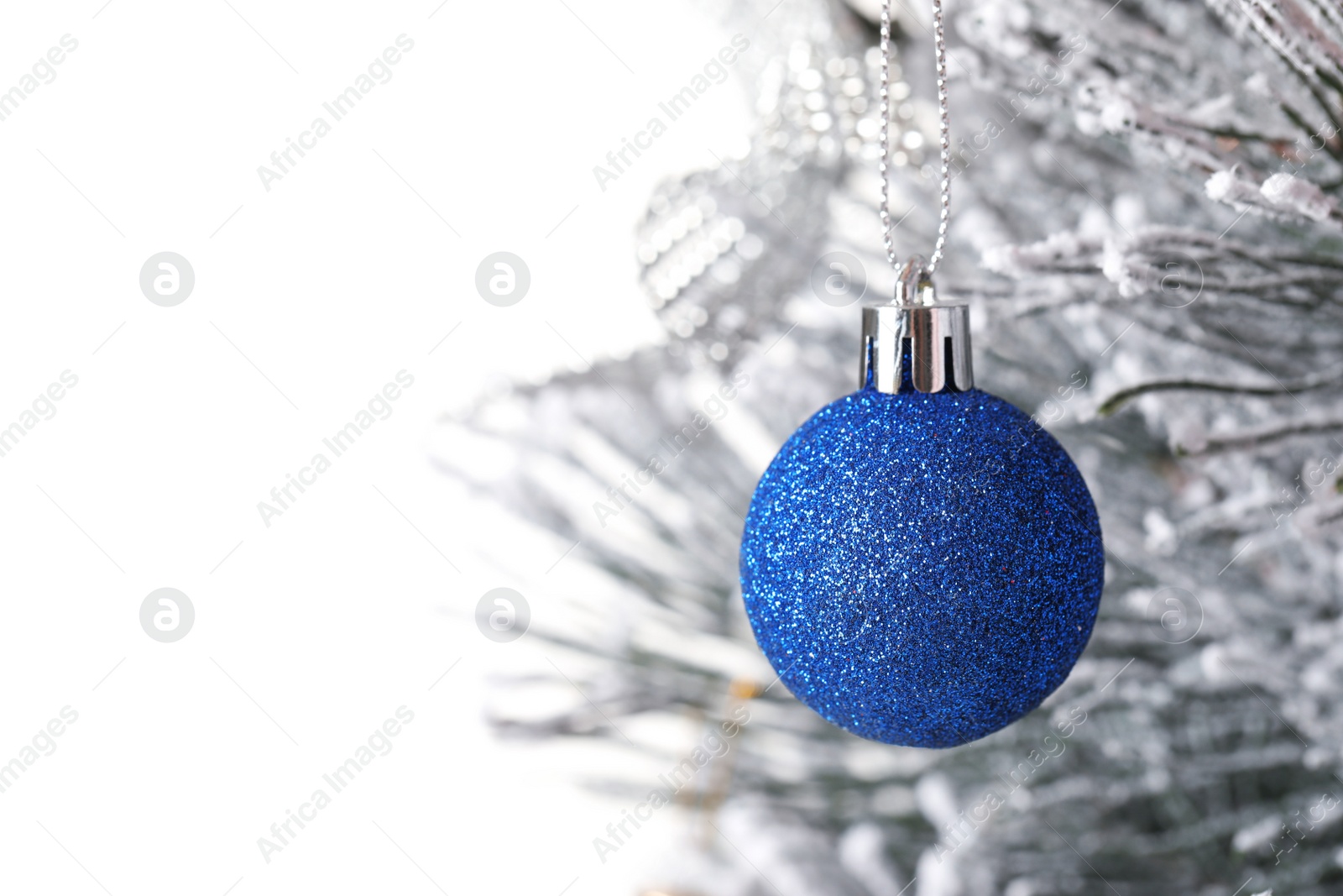 Photo of Beautiful Christmas tree with festive decor on white background, closeup