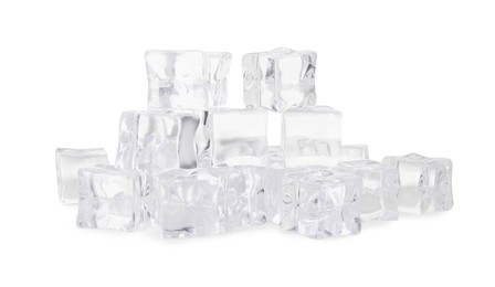 Many crystal clear ice cubes isolated on white