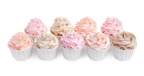 Photo of Tasty cupcakes with cream isolated on white