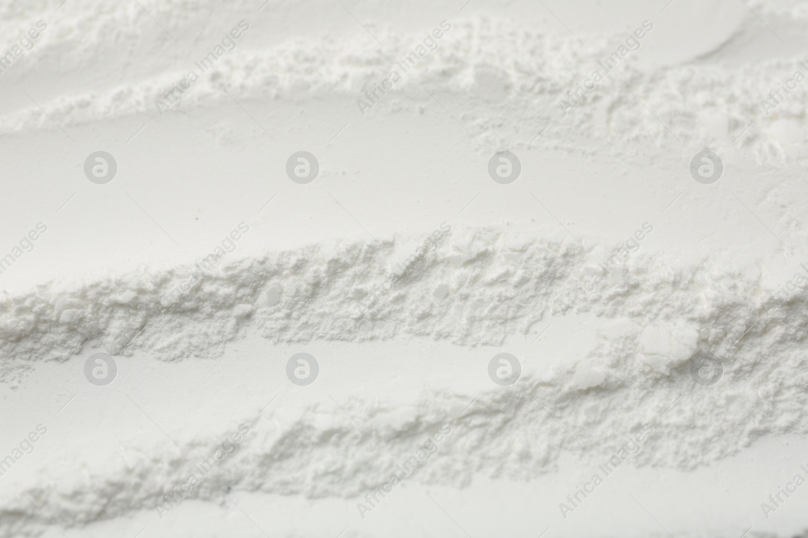 Photo of Texture of baking powder as background, closeup