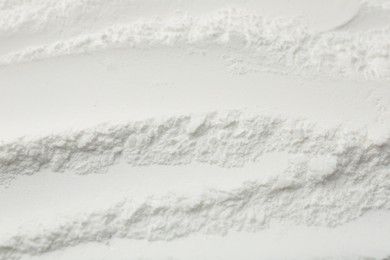 Photo of Texture of baking powder as background, closeup