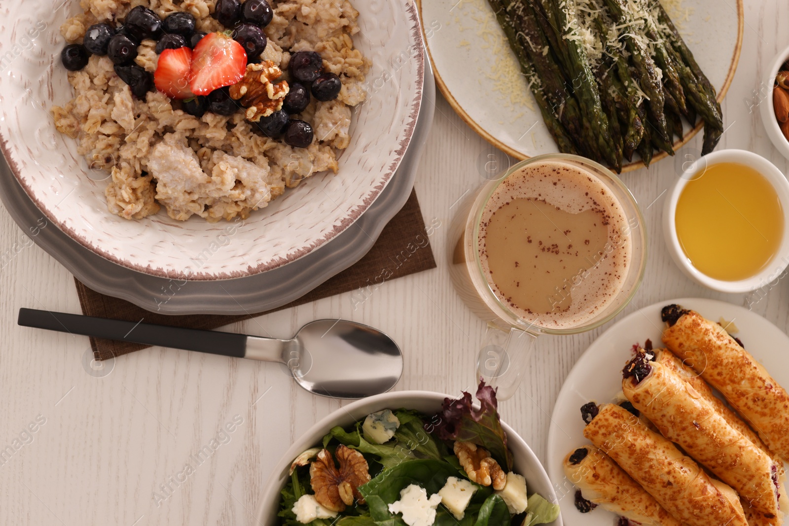 Photo of Many different dishes served on buffet table for brunch, flat lay