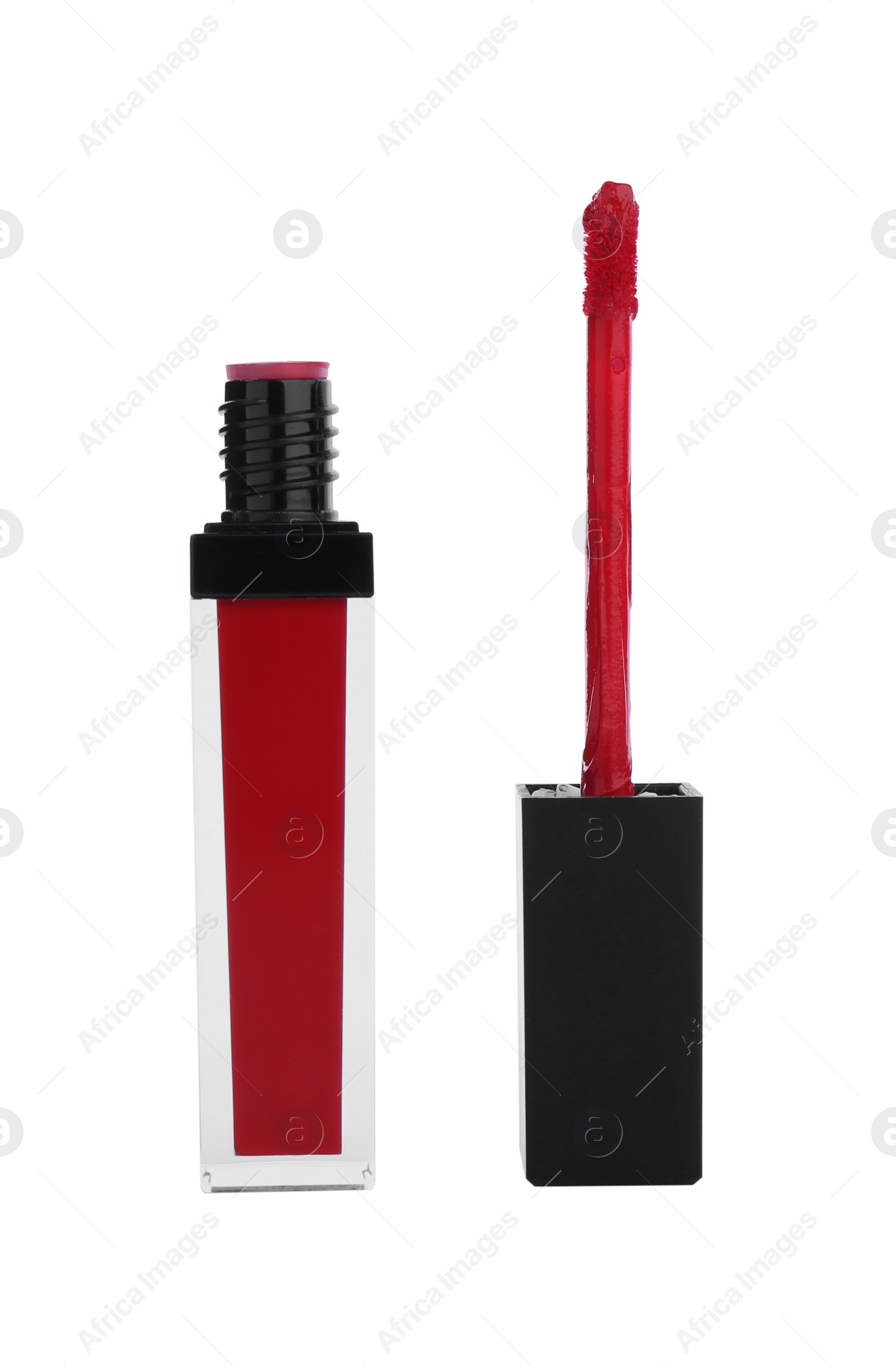 Photo of Red lip gloss and applicator isolated on white. Cosmetic product