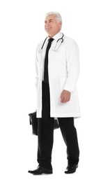 Full length portrait of male doctor with briefcase isolated on white. Medical staff