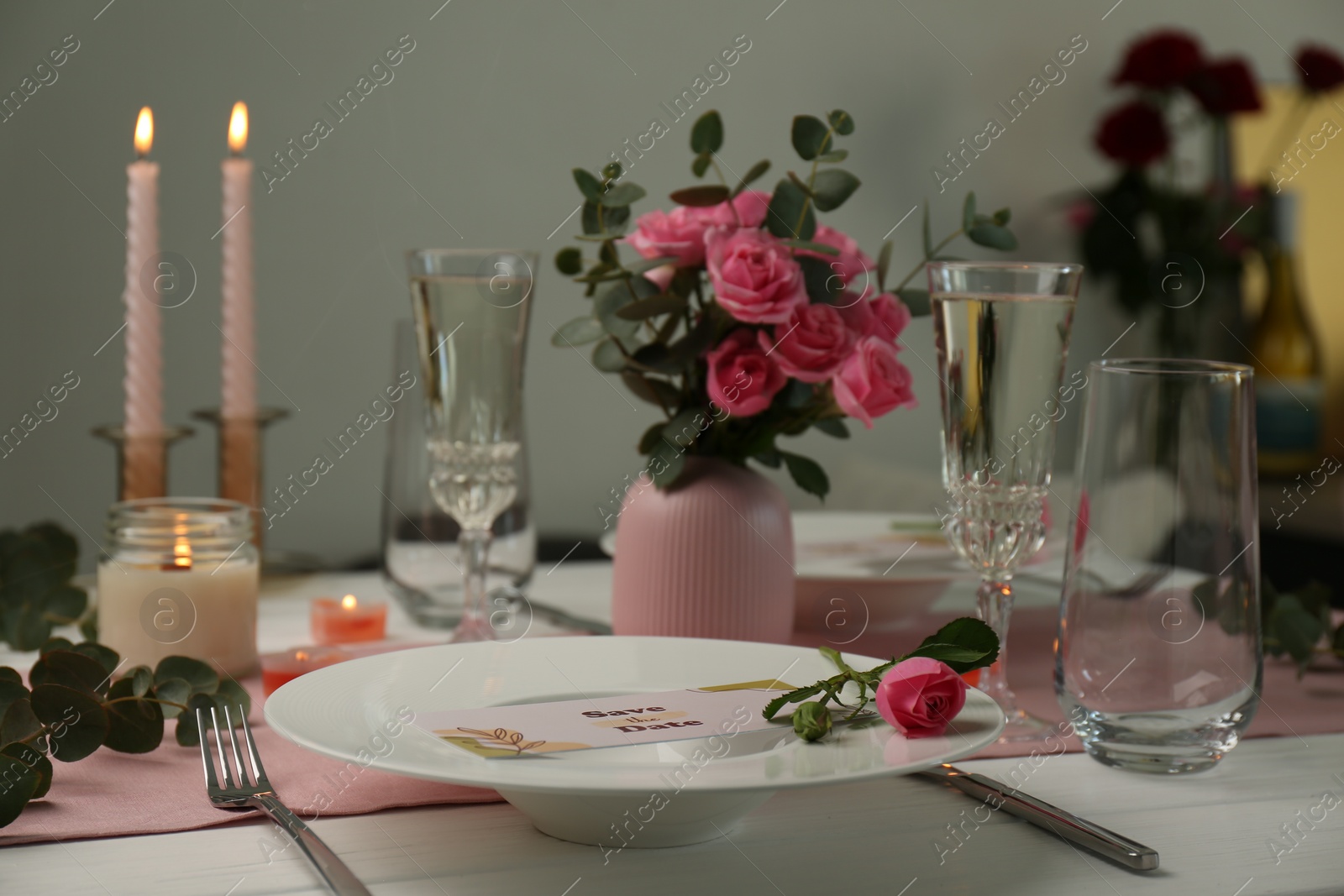 Photo of Romantic table setting with flowers and candles