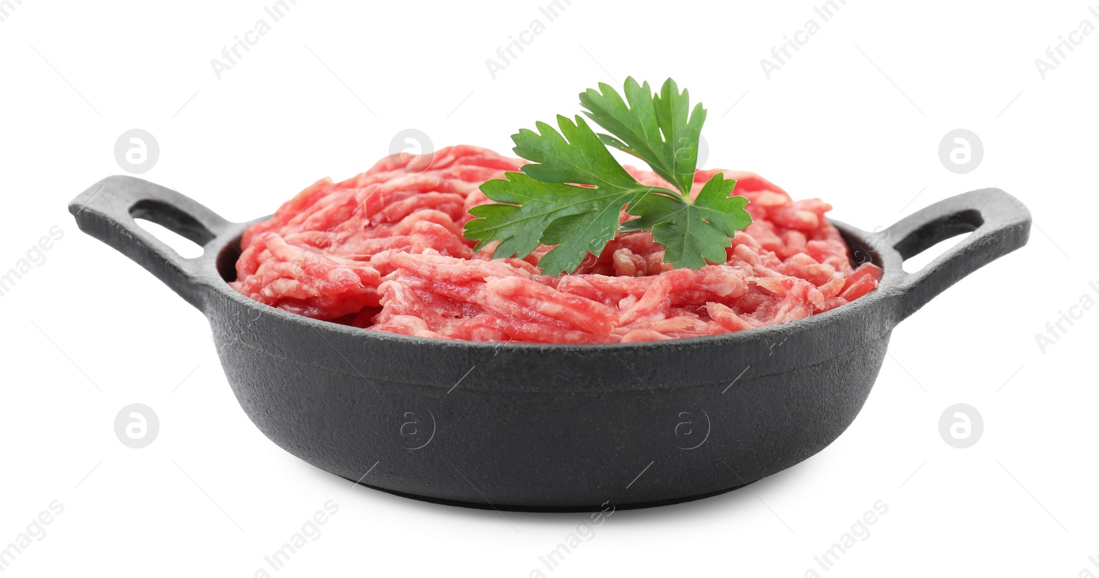 Photo of Raw ground meat and parsley in bowl isolated on white