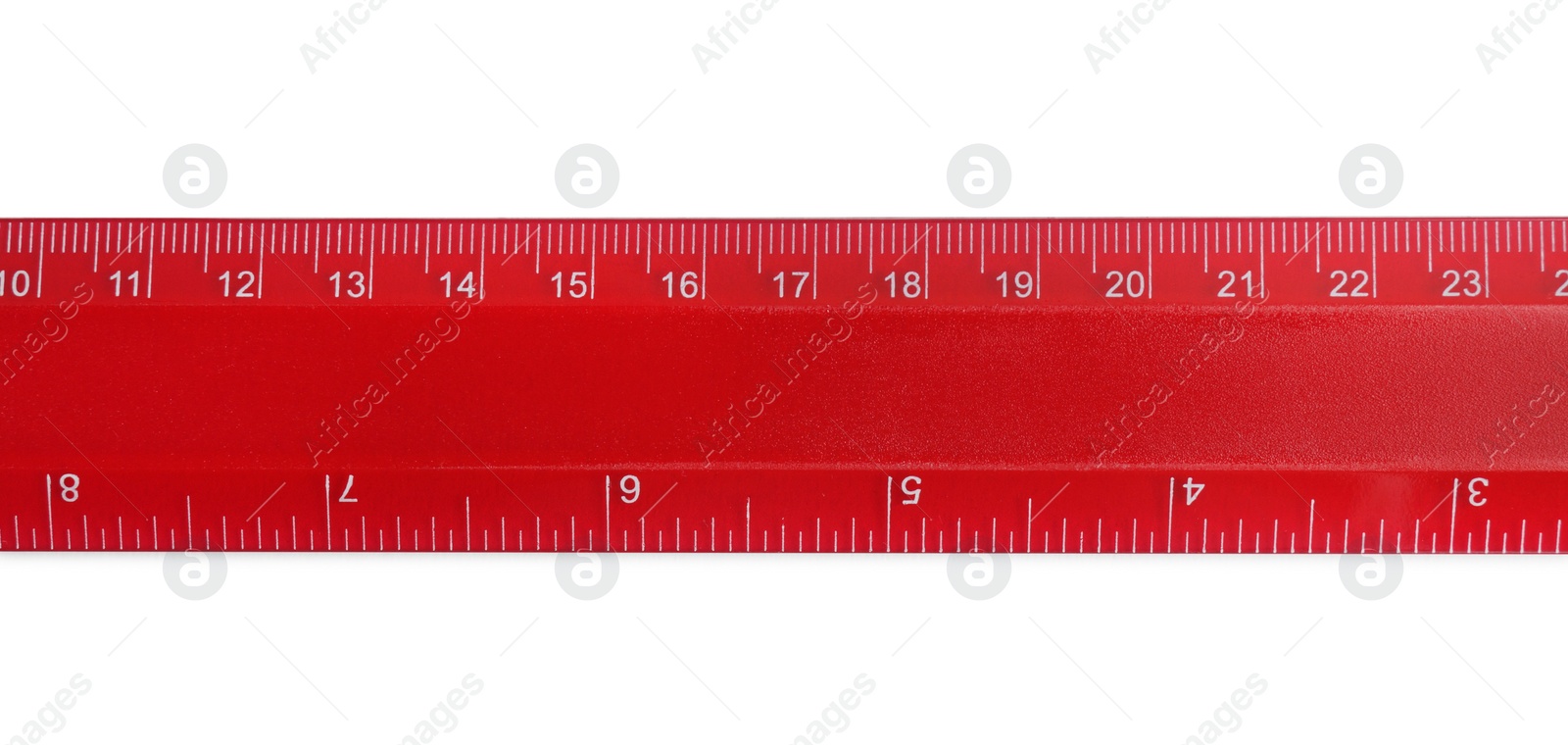 Photo of Ruler with measuring length markings in centimeters isolated on white, top view