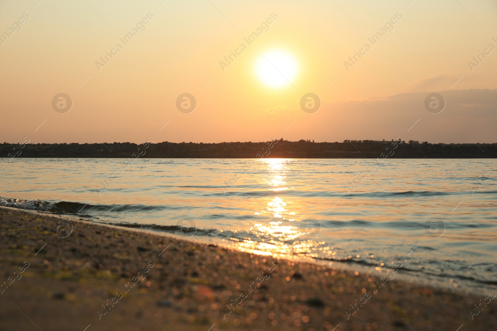 Photo of Landscape with beautiful sunset over calm river