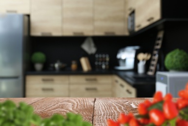 Image of Wooden table in kitchen. Space for design