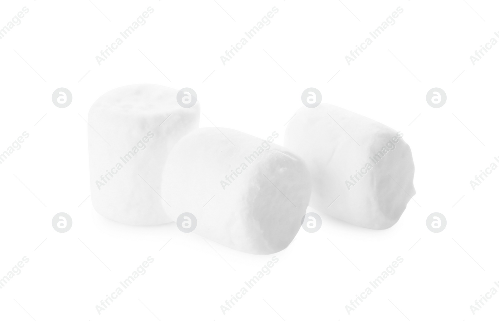 Photo of Delicious sweet puffy marshmallows isolated on white