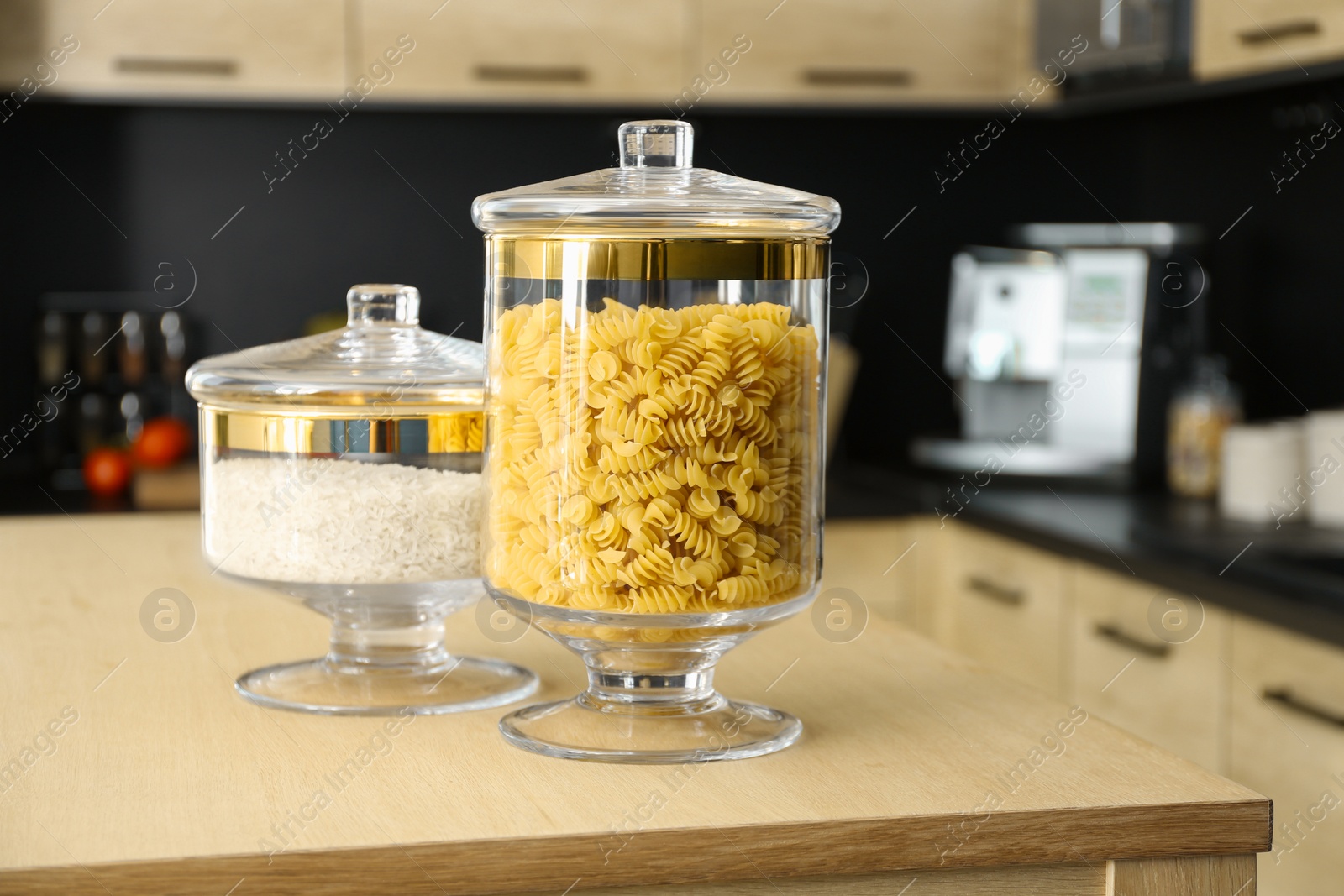 Photo of Products on wooden table in modern kitchen