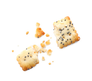 Photo of Broken crispy cracker with poppy and sesame seeds isolated on white, top view