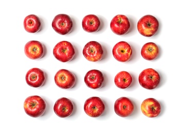 Many red apples on white background, top view