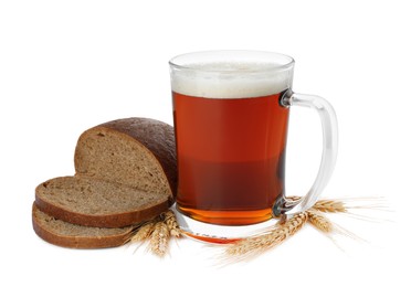 Delicious kvass, bread and spikes on white background