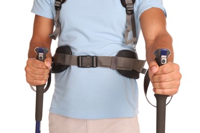 Photo of Male hiker with backpack and trekking poles on white background, closeup