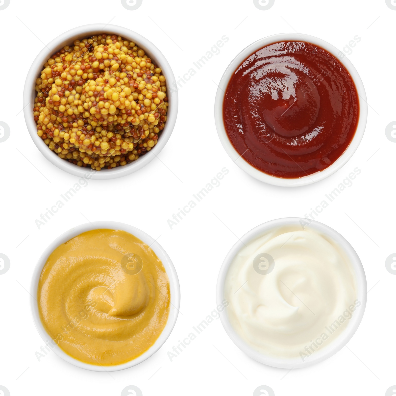 Image of Set of different sauces in bowls isolated on white, top view