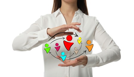 Image of Woman holding illustration of scheme with human figures linked together as network on white background, closeup