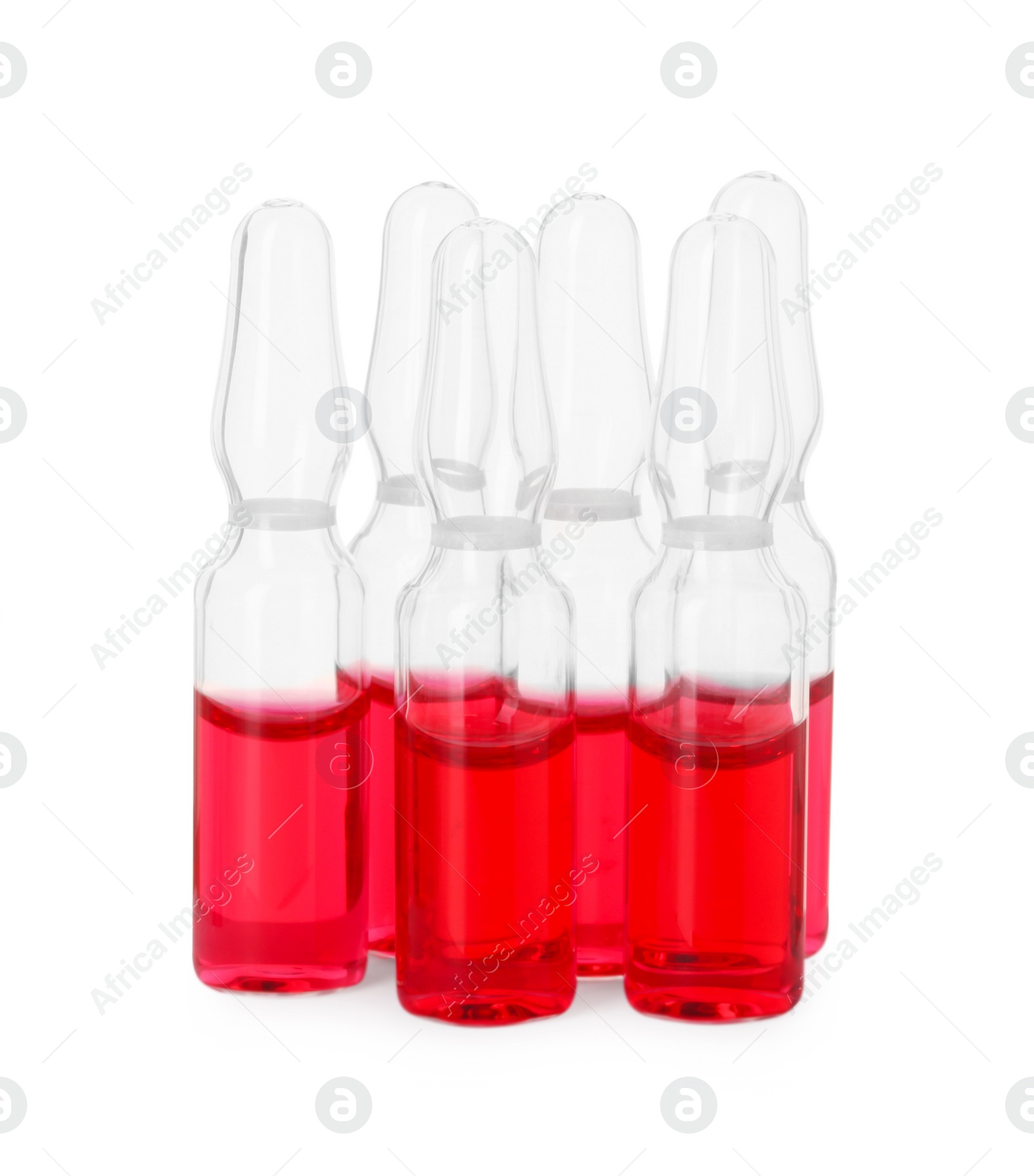 Photo of Glass ampoules with liquid isolated on white