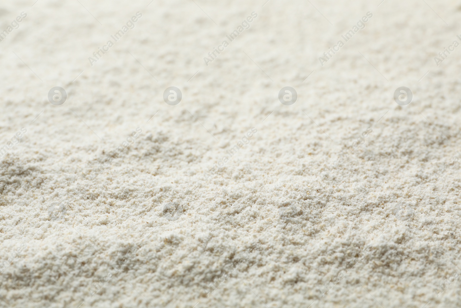 Photo of Oat flour as background, closeup. Gluten free product