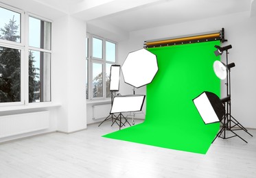 Image of Chroma key compositing. Green backdrop and equipment in studio
