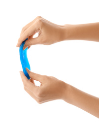 Photo of Woman playing with blue slime isolated on white, closeup. Antistress toy