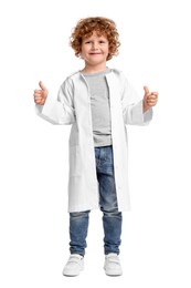 Little boy in medical uniform showing thumbs up on white background