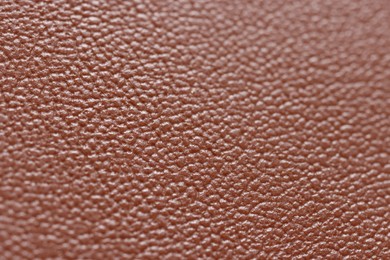 Photo of Brown natural leather as background, closeup view
