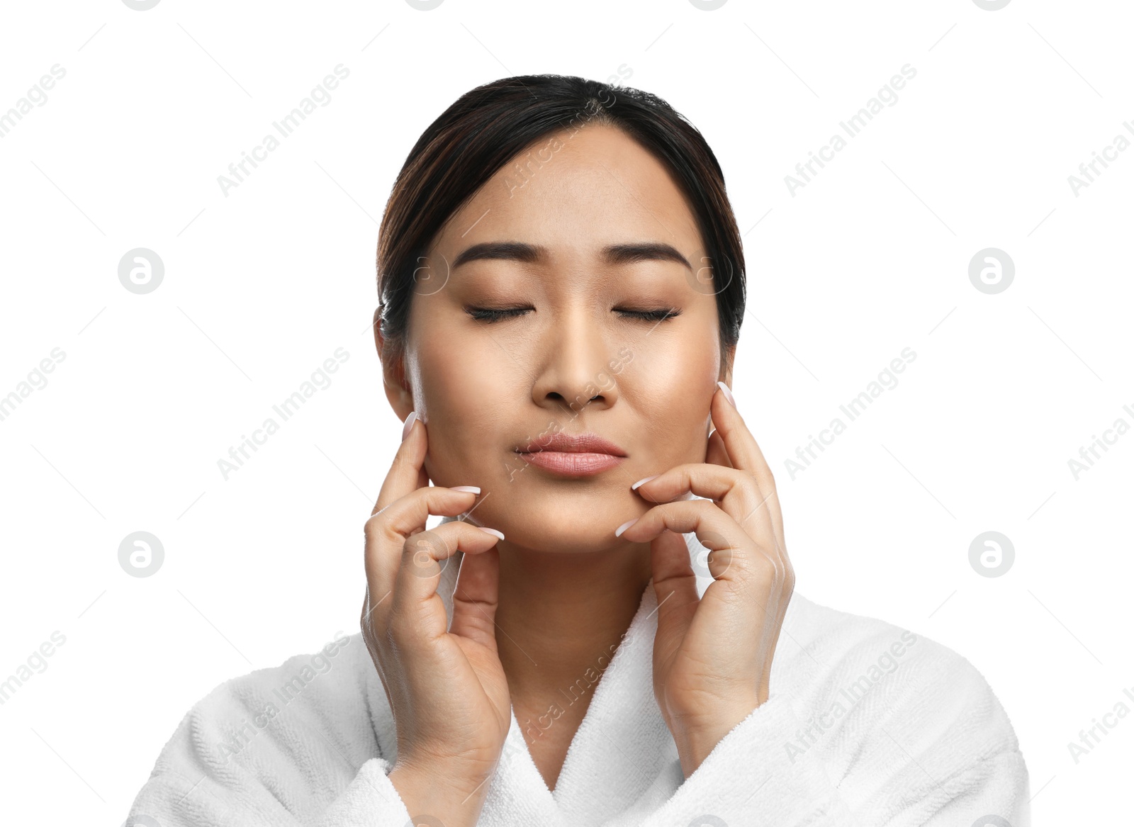 Photo of Portrait of beautiful Asian woman in bathrobe isolated on white. Spa treatment