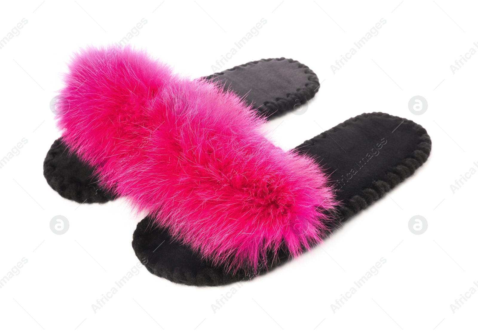 Photo of Pair of fluffy slippers isolated on white