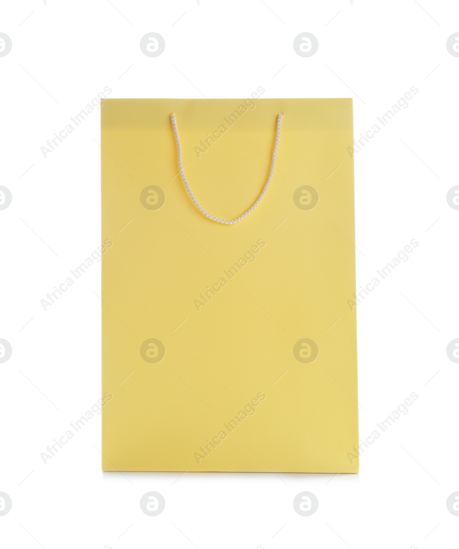 Photo of Yellow paper shopping bag isolated on white