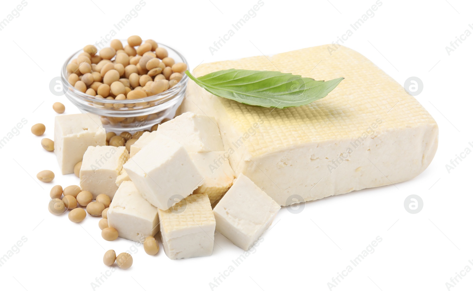 Photo of Delicious tofu cheese, basil and soybeans isolated on white