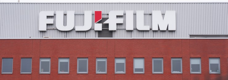 Photo of Warsaw, Poland - September 10, 2022: Beautiful modern Fujifilm logo on building