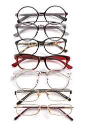 Photo of Different glasses with corrective lenses on white background. Vision problem