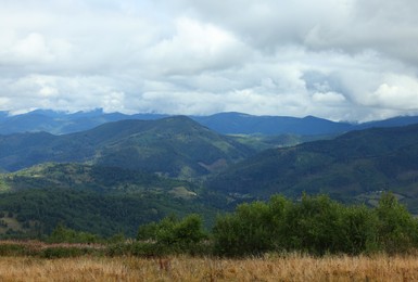 Photo of Picturesque view of mountain landscape and cloudy sky