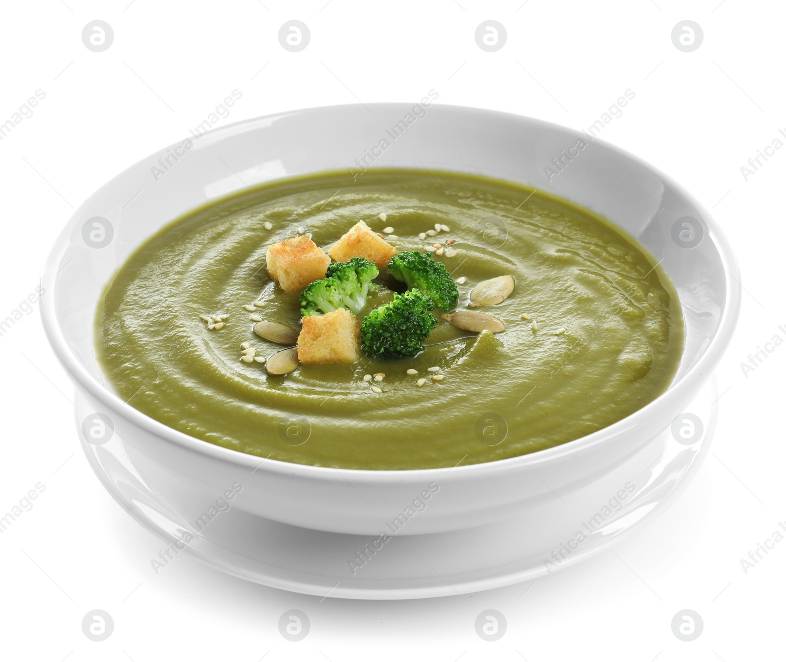 Photo of Dish with broccoli cream soup on white background. Healthy food