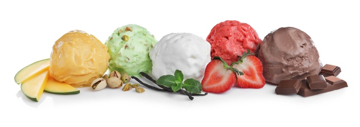 Scoops of different ice creams and ingredients on white background