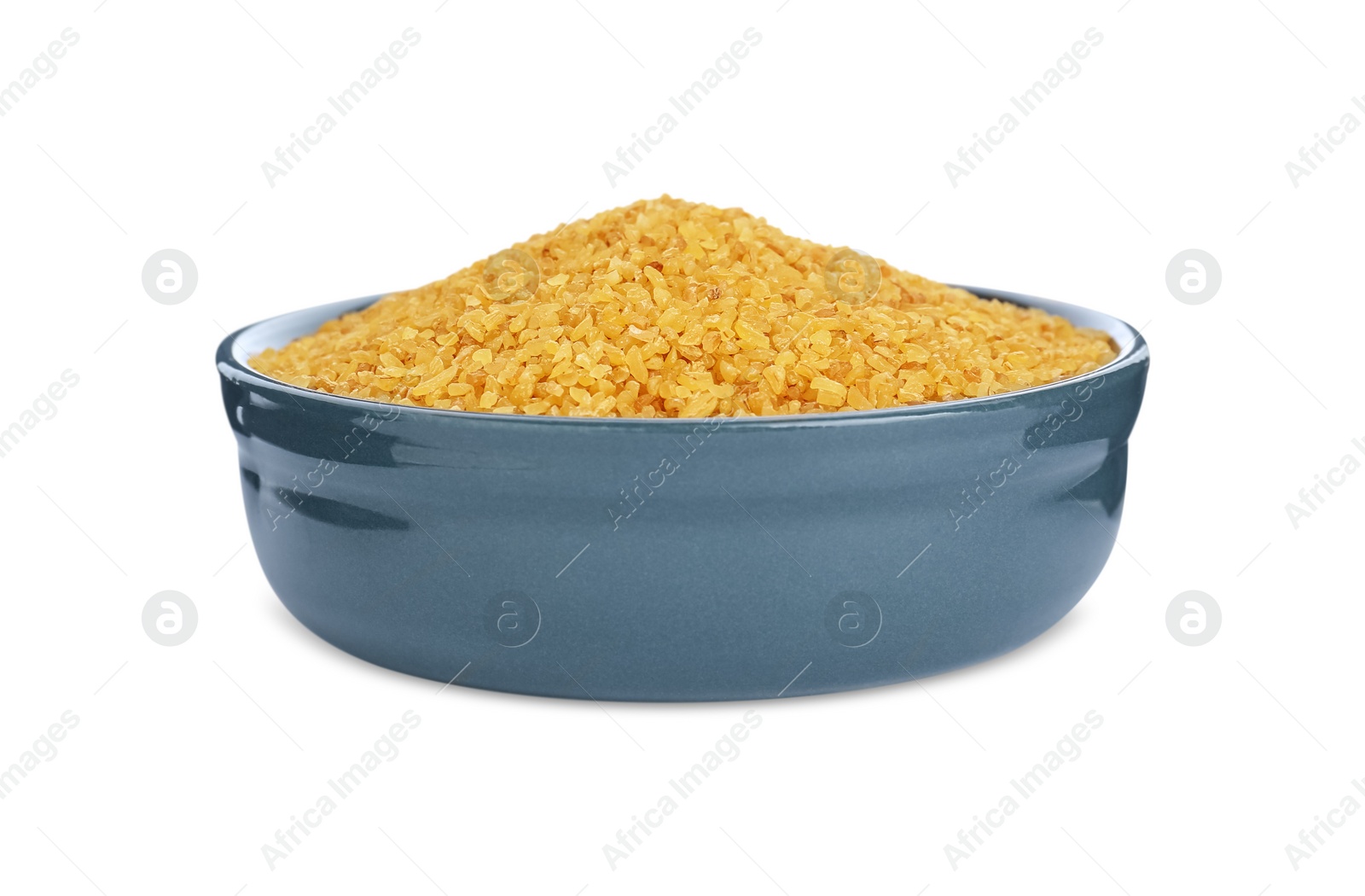 Photo of Bowl with uncooked bulgur isolated on white