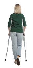 Photo of Woman with crutches on white background, back view