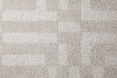 Photo of Fuzzy carpet texture as background, top view