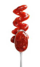 Photo of Delicious tomato sauce and spoon on white background, top view