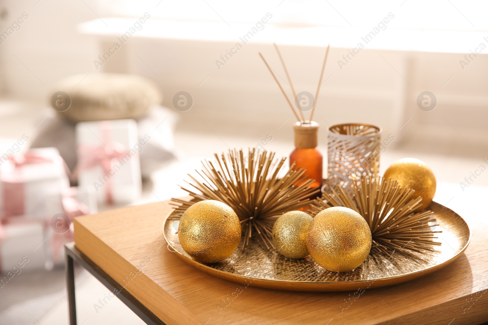 Photo of Elegant Christmas decor on table indoors. Interior design