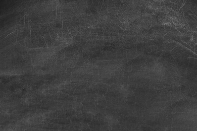 Photo of Clean chalkboard surface with space for text, closeup