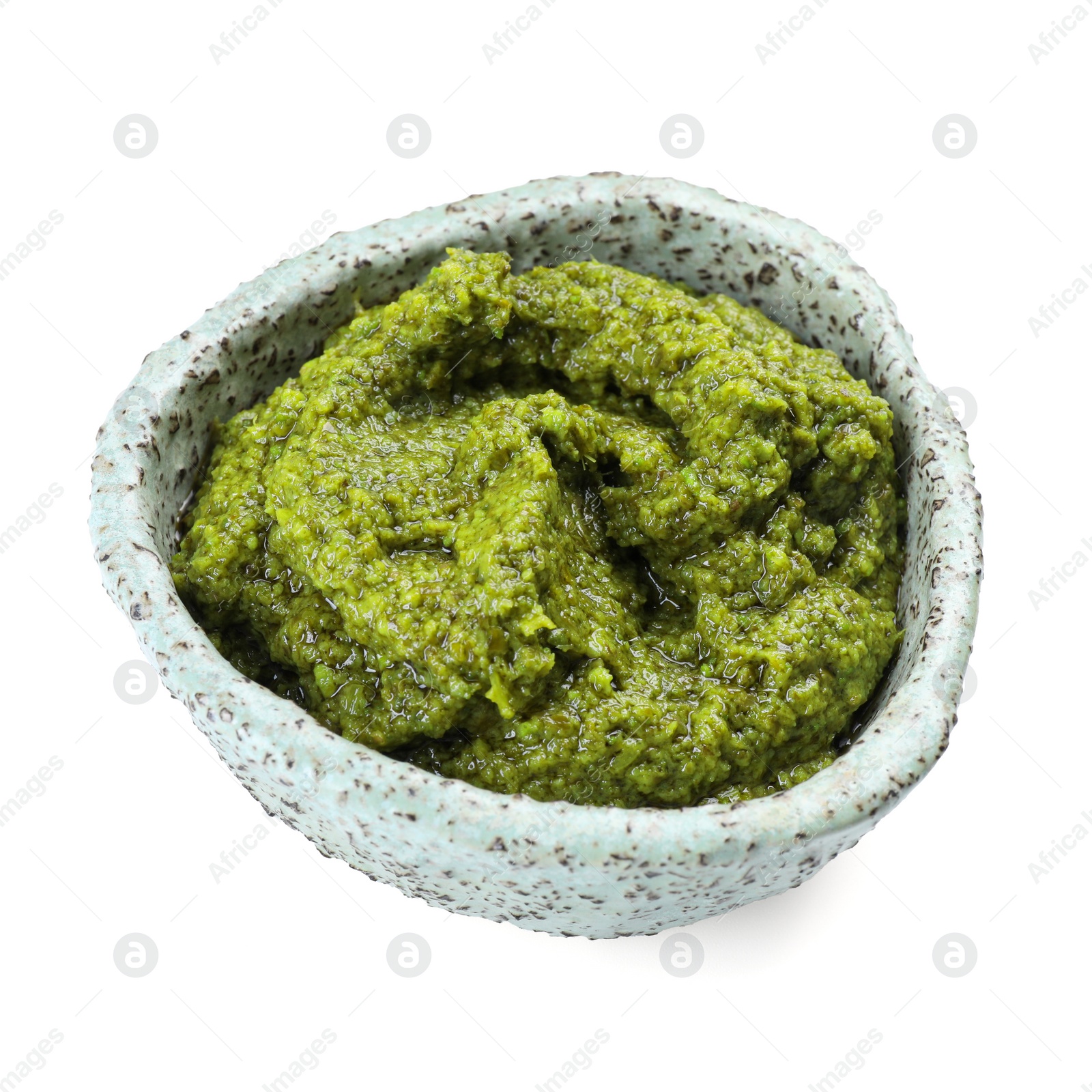 Photo of Fresh tasty pesto sauce isolated on white