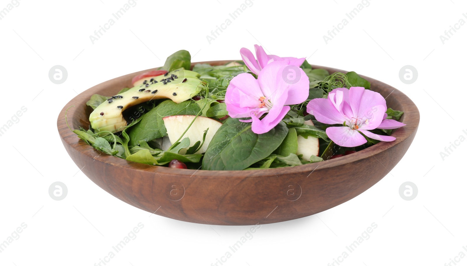 Photo of Fresh spring salad with flowers in bowl isolated on white