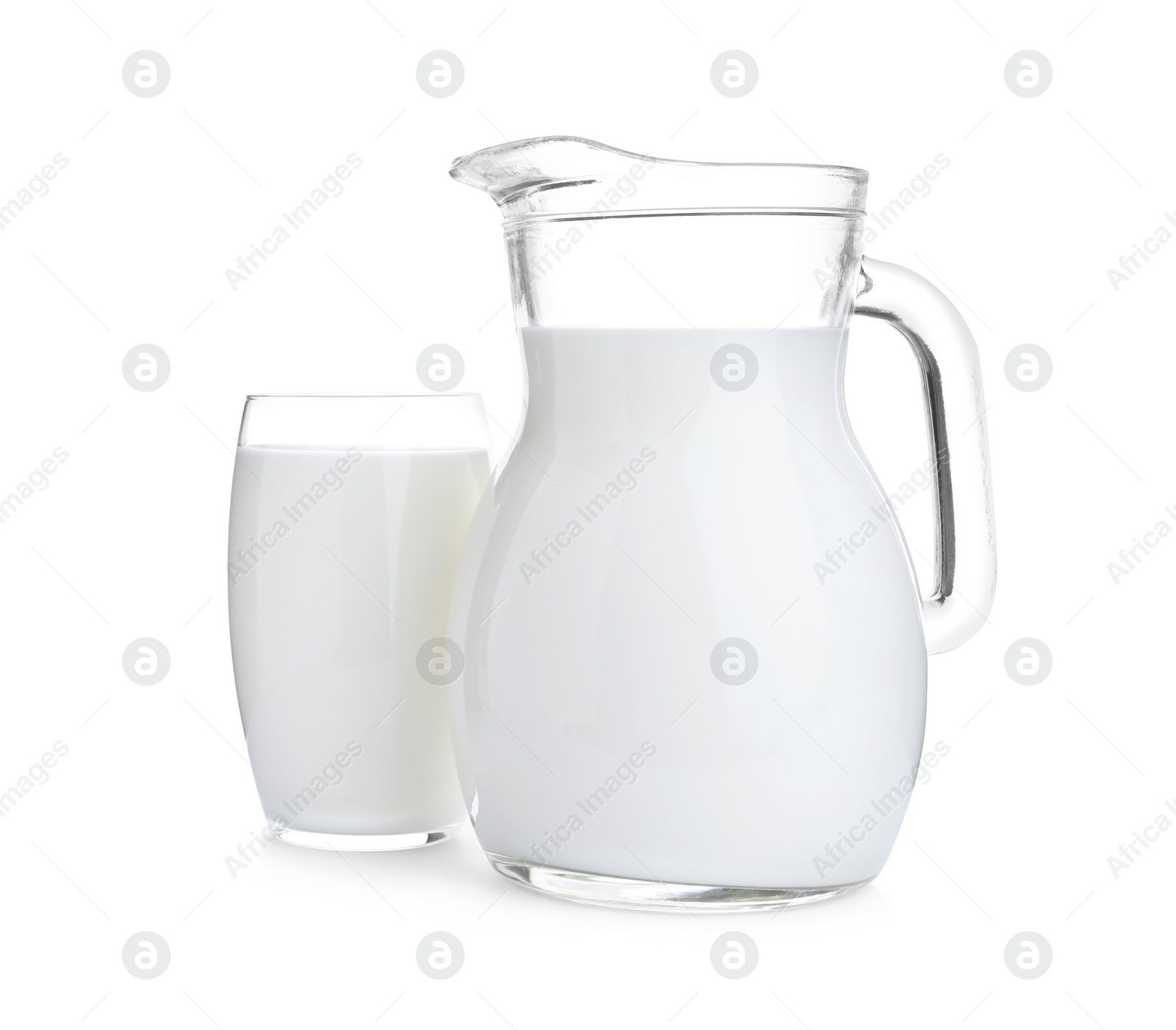 Photo of Jug and glass with fresh milk on white background