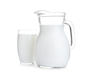 Jug and glass with fresh milk on white background