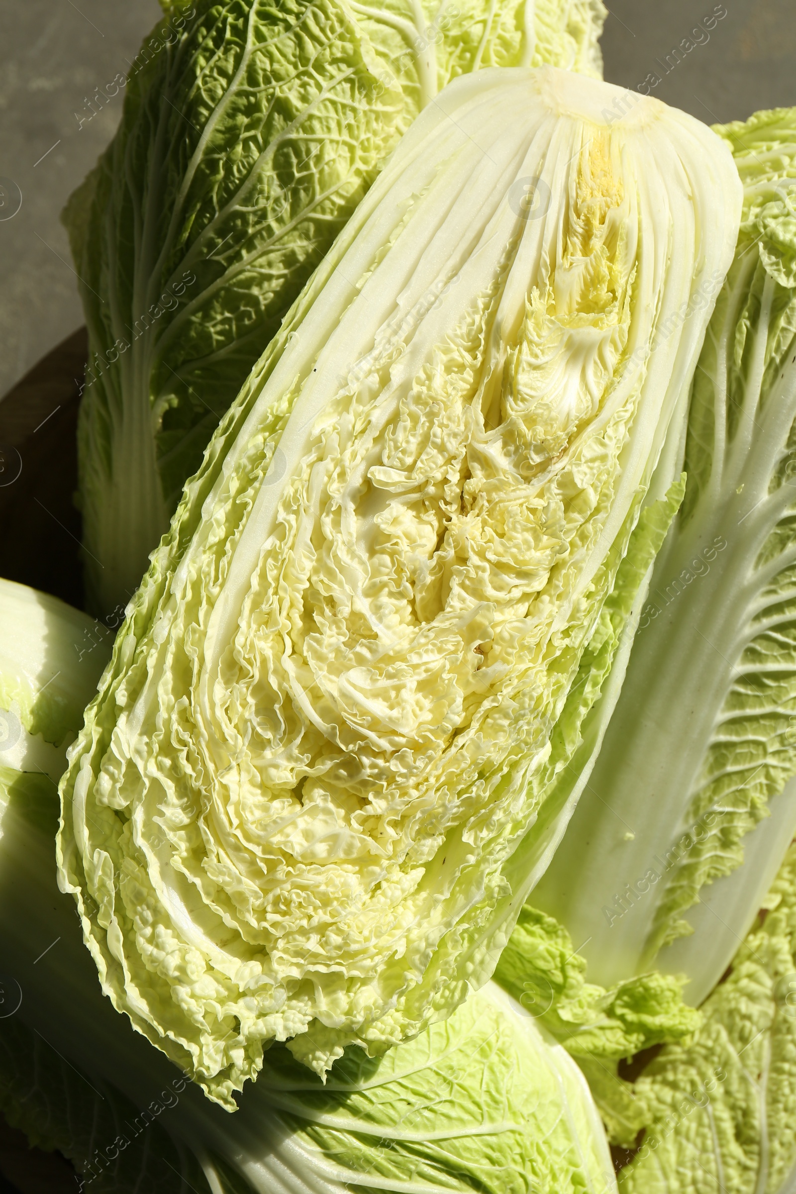 Photo of Fresh ripe Chinese cabbages on table, top view